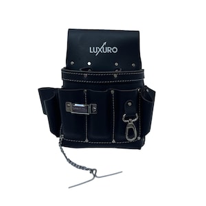 May include: Black leather tool belt with multiple pockets and a silver-tone metal clasp. The tool belt has white stitching and the word "LUXURO" printed in white on the flap. A silver chain and hook are attached.