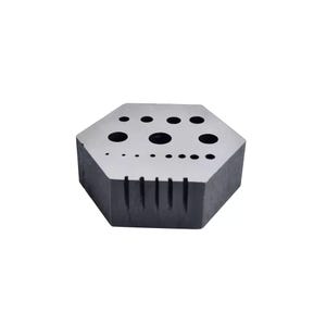 May include: A hexagonal metal tool with a variety of round holes of different sizes. The tool has a textured surface and is designed for crafting and jewelry making.