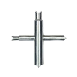 May include: A silver, cross-shaped tire valve stem tool. The tool has four arms, each with a different end for various valve stem functions. The central body is cylindrical with a slotted top. The tool is designed for automotive use.