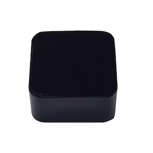 May include: A black square-shaped box with a glossy finish.