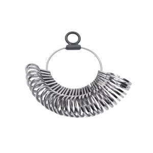 May include: A silver ring sizer with a black plastic handle. The sizer is a set of graduated rings that can be used to determine the size of a ring.