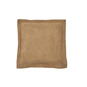 May include: A tan suede pillow with a square shape and a stitched border.