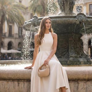 slim fit dress slacks Mira Halter Gown in White – Modern Sash Gown – Elliatt main image 0