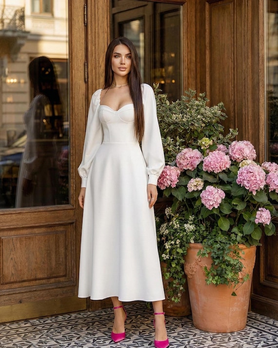 structured white dress Fairytale Dream Sheer Sleeve Mini it adds a touch of romance and charm Jenny Yoo Little White Dress