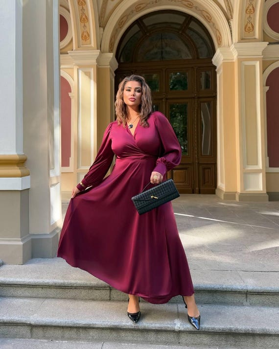 Plus Size Wrap Dress in Plum with Loose Cuffed Sleeves and Flared Skirt