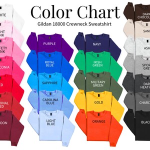 May include: A color chart of Gildan 18000 crewneck sweatshirts in various colors, including white, pink, red, blue, green, and black. Each sweatshirt displays its color name in white text. The chart is designed to showcase the available color options.