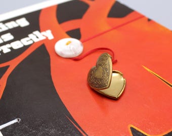 Nursing Journal with Heart Locket Closure