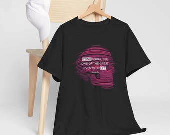 May include: Black t-shirt with a pink graphic of a skull and the text "DYING SHOULD BE ONE OF THE GREAT EVENTS OF LIFE" in white.