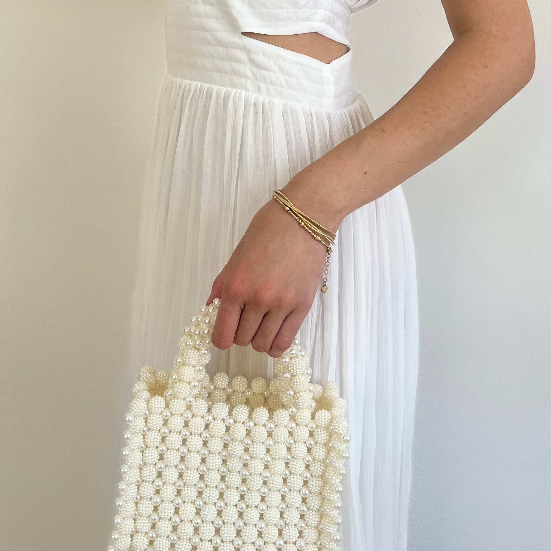 Sac pochette femme beige en suédine tendance avec franges et perles do
