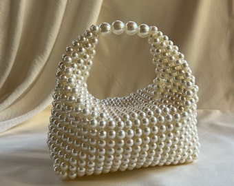 Handgemaakte clutch met parels: bruidshandtas