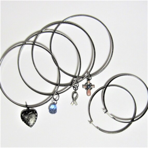 Four Vintage Bangles with Charms plus Matching Hoop Earrings Gunmetal Heart Locket Blue faceted Drop Hope Ribbon Enamel Cross