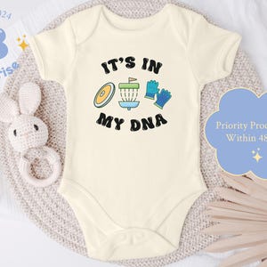 It’s In My DNA Disc Golf Baby Bodysuit – Future Disc Golfer Gift – Natural Onesie® image 1
