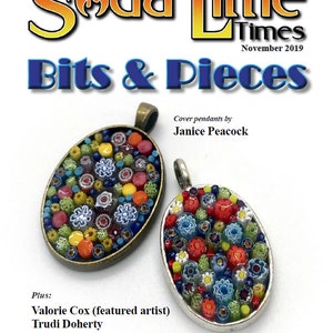 May include: Two oval-shaped pendants with colorful mosaic designs. The pendants are made of glass and have a silver and bronze finish. The text "Soda Lime Times November 2019 Bits & Pieces" is visible at the top of the image. The text "Cover pendants by Janice Peacock" is visible below the pendants.