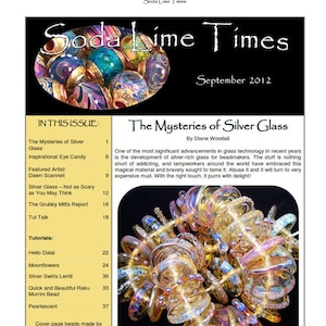 Puede incluir: Portada de la revista "Soda Lime Times", número de septiembre de 2012. Presenta una colección de cuentas de vidrio de colores y el título "Los misterios del vidrio plateado". La revista incluye artículos sobre técnicas de fabricación de vidrio.