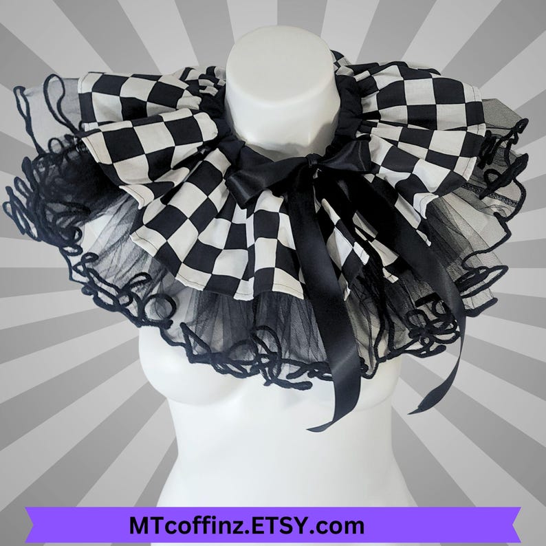 May include: A black and white chequered collar with a black satin bow and black tulle trim. The collar is displayed on a white mannequin. The Etsy shop name MTcoffinz.ETSY.com is printed on a purple banner at the bottom.