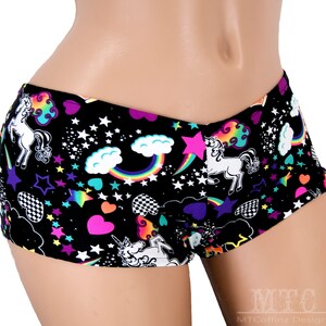 May include: Black underwear with a colourful unicorn, rainbow, and star print.