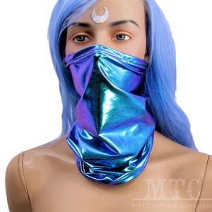 May include: A blue iridescent face mask with a shiny, metallic finish. The mask is made of a soft, stretchy fabric and is designed to cover the nose and mouth.