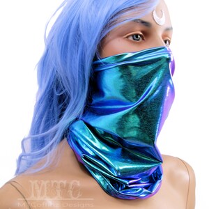 May include: A blue iridescent face mask with a metallic sheen. The mask is made of a stretchy fabric and covers the nose and mouth.