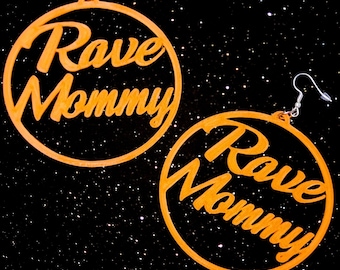 May include: A pair of orange hoop earrings with the text "Rave Mommy" written in a stylized font.
