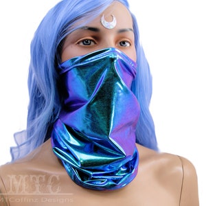 May include: A blue iridescent face mask with a metallic sheen. The mask is made of a stretchy fabric and is designed to cover the nose and mouth.