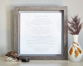 Voetafdrukken in het zand