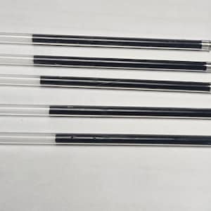 May include: Five black and clear pen refills with red tips.