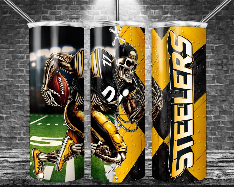 May include: A stainless steel tumbler featuring a football-themed design. The design includes a skeleton wearing a football uniform, holding a football, and the word "STEELERS" in bold letters. The color scheme is black and yellow.