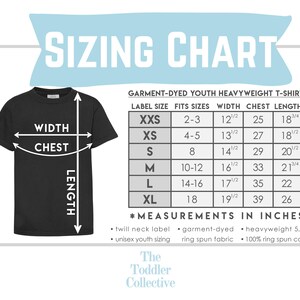 May include: Sizing chart for garment-dyed youth heavyweight t-shirts. The chart shows label size, fits sizes, width, chest, and length in inches. The chart is labeled "The Toddler Collective."