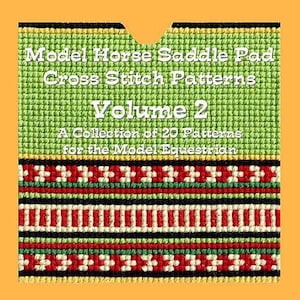 May include: A green and yellow book cover with the title "Model Horse Saddle Pad Cross Stitch Patterns Volume 2" and the text "A Collection of 20 Patterns for the Model Equestrian".