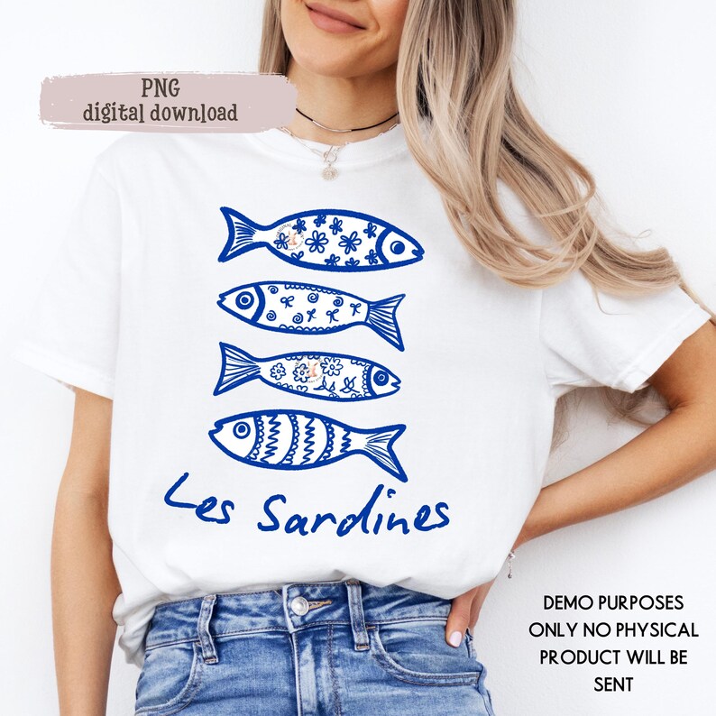 May include: White t-shirt featuring four blue fish designs with floral and patterned details. The text "Les Sardines" is printed in blue below the fish. The shirt is a digital download.