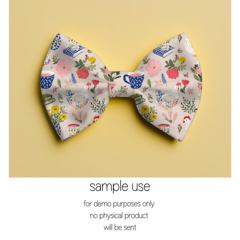 May include: A fabric bow tie featuring a cream background with a pattern of pink flowers, blue teacups, and books. The bow tie is displayed on a yellow background. The text at the bottom reads "sample use".