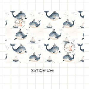 May include: A seamless pattern featuring blue whales wearing sailor hats and small sailboats on a white background with a subtle speckled texture. The text "Original Design by Digi Bunny Studio" appears in the pattern.