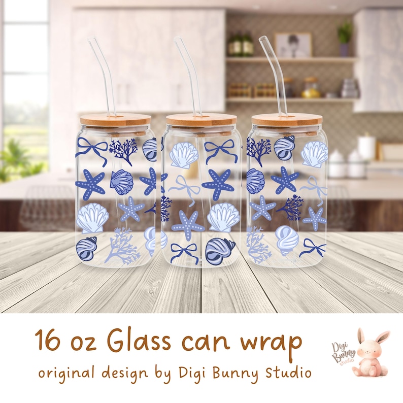 May include: Three 16 ounce glass can wraps with a blue and white seashell and starfish design. The wraps have a wooden lid and a straw.