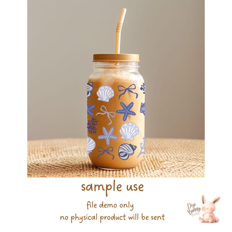 May include: A clear glass jar with a brown lid and a straw, filled with a light brown liquid. The jar is decorated with a pattern of blue and white seashells, starfish, and bows.