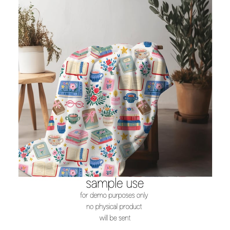 May include: A white blanket with a repeating pattern of books, flowers, teacups, and candles. The blanket is draped over a wooden chair. The text "sample use for demo purposes only no physical product will be sent" is printed at the bottom.
