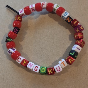 Consecrated Chango. Pony bead for year of Horse. Plus size friendly. Wrist incant Shango - Lightning Orisa. Iwo Etu - Elekes Omiyo - red .