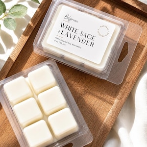 May include: Two clear plastic clamshell containers filled with white soy wax melts. The top label reads Belgreen, WHITE SAGE + LAVENDER, Hand-poured Soy Wax Melts, 8 oz | 65 hrs, and includes a circular stamp that says NATURAL ECO-FRIENDLY.