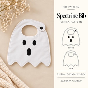 Puede incluir: Un babero blanco con forma de fantasma, ojos y boca ovalados negros y un cierre de broche negro. El texto dice PDF PATTERN Spectrine Bib CERISA PATTERN, mostrando vistas frontal y trasera para las tallas 0-12M y 12-36M, indicado como Beginner Friendly.