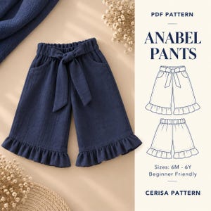 May include: Navy blue pants with an elastic waistband, a tie-front detail, and ruffled hems. The image includes text reading PDF PATTERN ANABEL PANTS, Sizes: 6M - 6Y Beginner Friendly, and CERISA PATTERN, alongside line drawings of the pants.