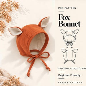 May include: A PDF pattern for a fox bonnet featuring a rust-orange fabric hat with pointed ears and cream-colored lining. The text reads PDF PATTERN Fox Bonnet, Sizes 0-3M, 6-12M, 1-2Y, 2-3Y, Beginner Friendly, and CERISA PATTERN.