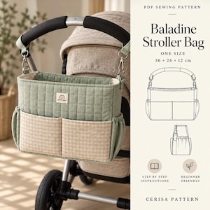 May include: A sage green quilted stroller bag with two beige gingham front pockets, attached to a stroller handle with silver clips. The bag features a small label with a rainbow icon and the text petit pou. Dimensions are 36 x 26 x 12 cm.