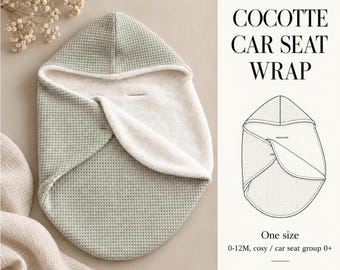 Könnte beinhalten: Eine salbeigrüne Wickeldecke für Autositze mit Waffelstruktur, weißem Innenfutter und Kapuze. Der Text lautet PDF PATTERN COCOTTE CAR SEAT WRAP, One size 0-12M, cosy / car seat group 0+, Beginner Friendly, CERISA PATTERN, inklusive einer Strichzeichnung.