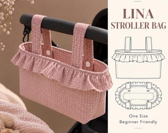 Könnte beinhalten: Eine altrosa Kinderwagentasche aus strukturiertem Stoff mit Rüschenbesatz und zwei oberen Riemen mit weißen Knöpfen. Das Bild enthält den Text PDF PATTERN LINA STROLLER BAG, eine Strichzeichnung der Tasche und den Text One Size Beginner Friendly CERISA PATTERN.