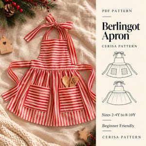 Puede incluir: Un delantal de rayas rojas y blancas con lazo al cuello, dos bolsillos delanteros y falda fruncida. El texto dice PDF PATTERN Berlingot Apron CERISA PATTERN Sizes 2-4Y to 8-10Y Beginner Friendly. Una cuchara de madera está en un bolsillo.