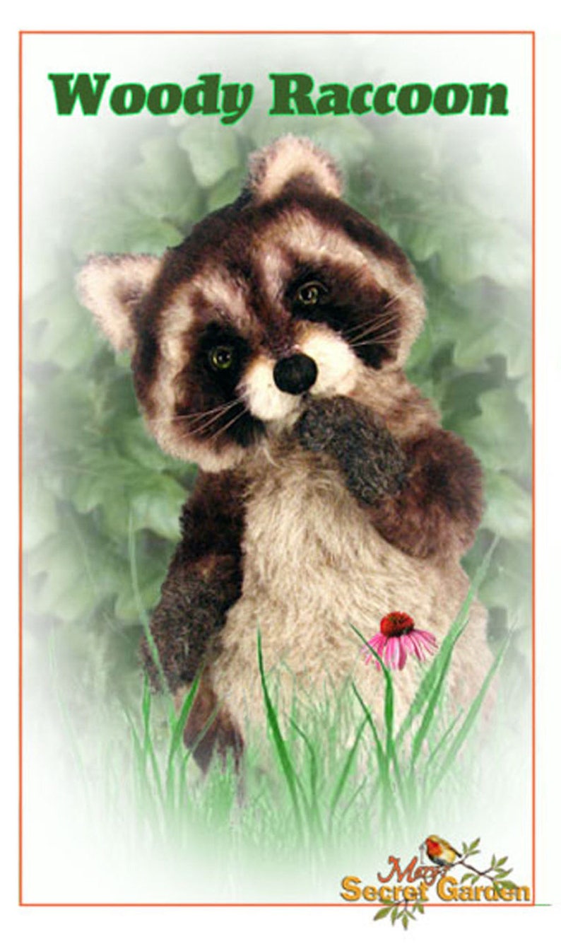 May include: A plush raccoon toy named "Woody Raccoon" is standing in a green grassy area with a pink flower. The toy has a brown and gray fur pattern and is looking to the side. The text "My Secret Garden" is at the bottom of the image.