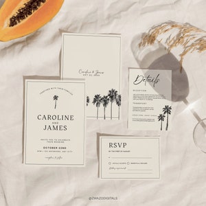 May include: A wedding invitation suite with a tropical theme. The invitation features a palm tree illustration and the text "Caroline and James" with the wedding date "October 22nd". The RSVP card has a black and white palm tree illustration and the text "RSVP by the first of August". The details card has a black and white palm tree illustration and the text "Details".