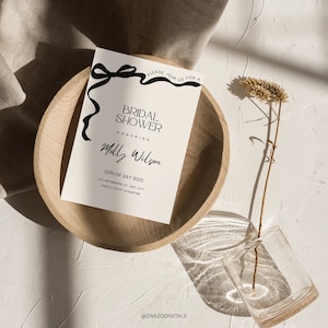 Modèle d'invitation pour la douche nuptiale, noeud dessiné à la main, ruban de célibataire, enterrement de vie de jeune fille, noeud fantaisie, noir et blanc, toile numérique modifiable