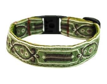 May include: Green and brown patterned dog collar with a black plastic buckle.