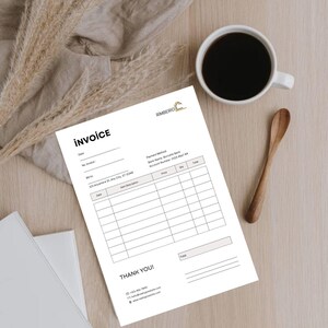 May include: A blank invoice template with the company name "Rimberio" at the top. The invoice includes fields for date, invoice number, billing address, payment method, price, quantity, and total. The text "Thank You!" is at the bottom of the invoice.