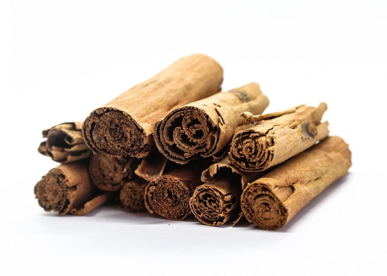 Close-up of Ceylon cinnamon sticks, aromatic botanical bark
